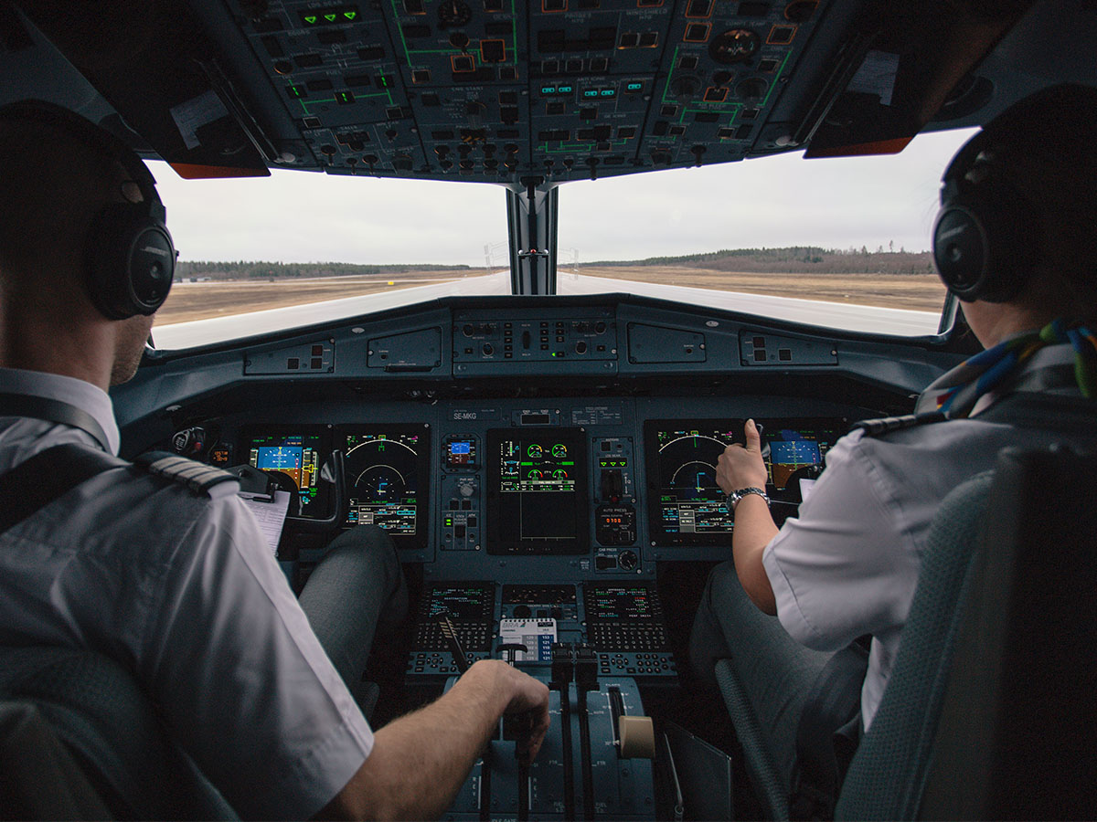 Pilots in an aircraft cockpit