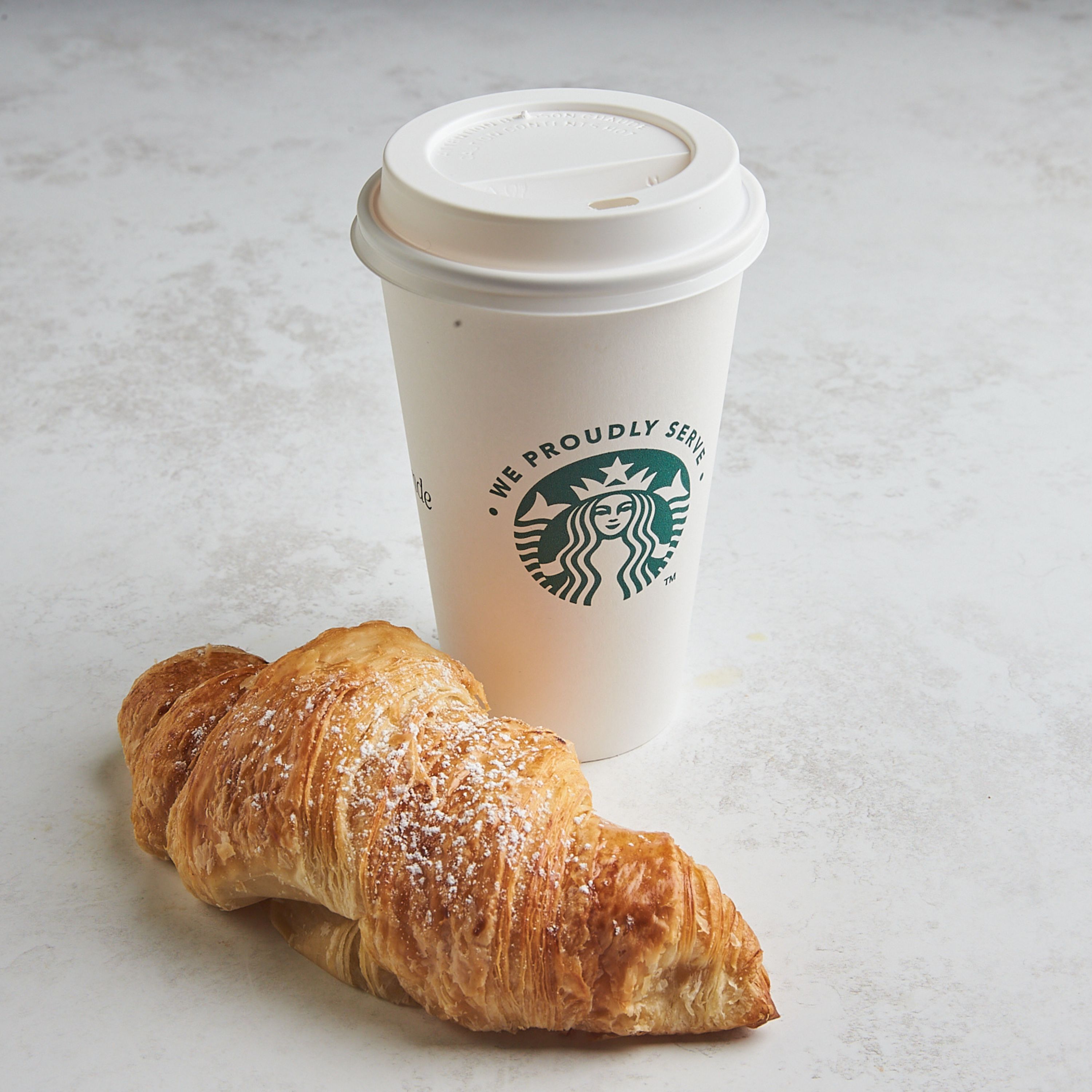 Starbucks coffee and croissant